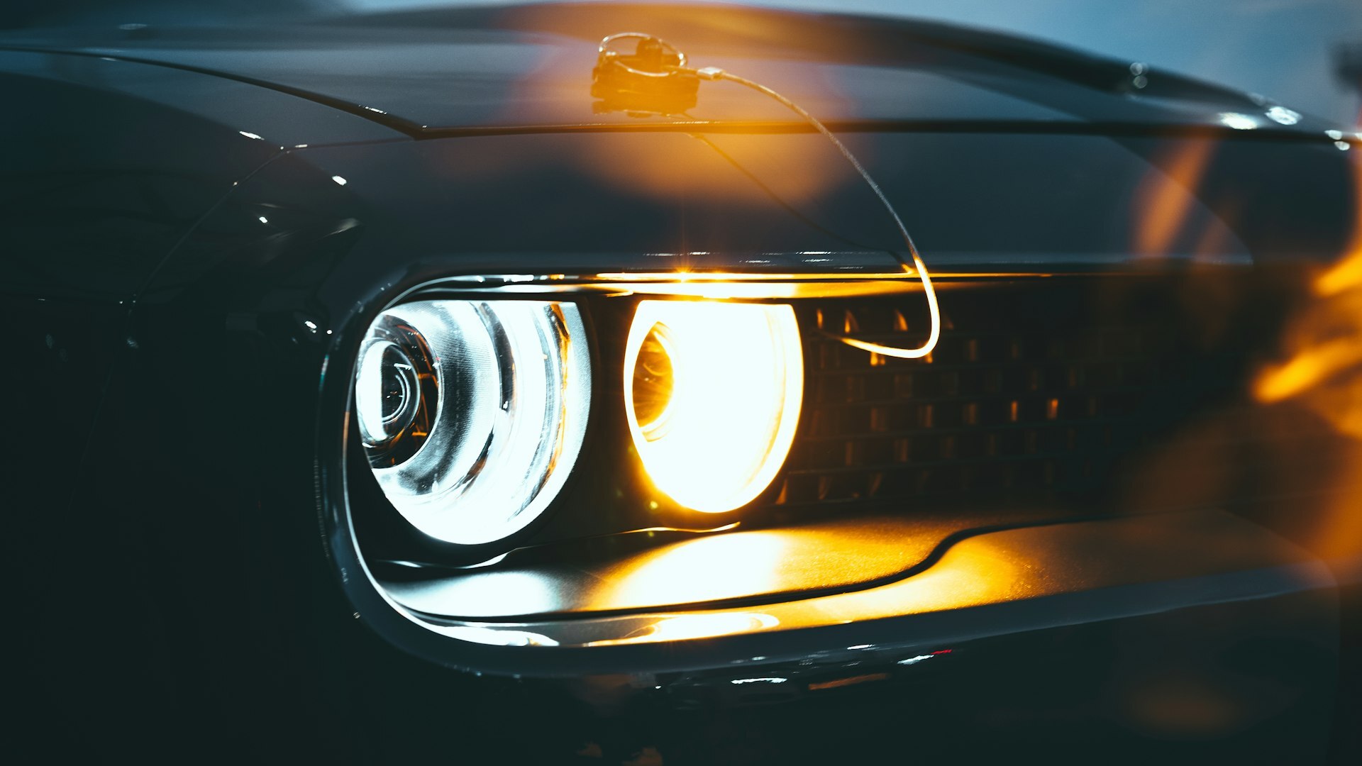 black car with yellow lights black car with yellow lights