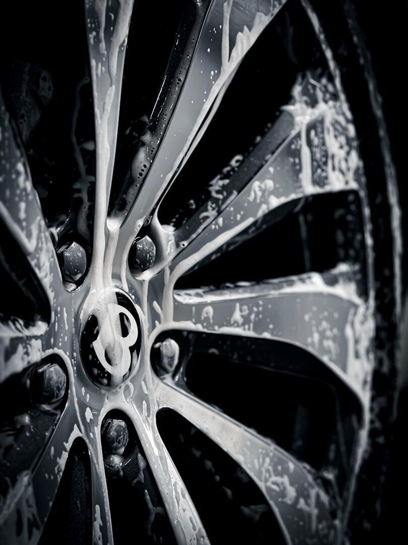 a close up of a tire on a car a close up of a tire on a car